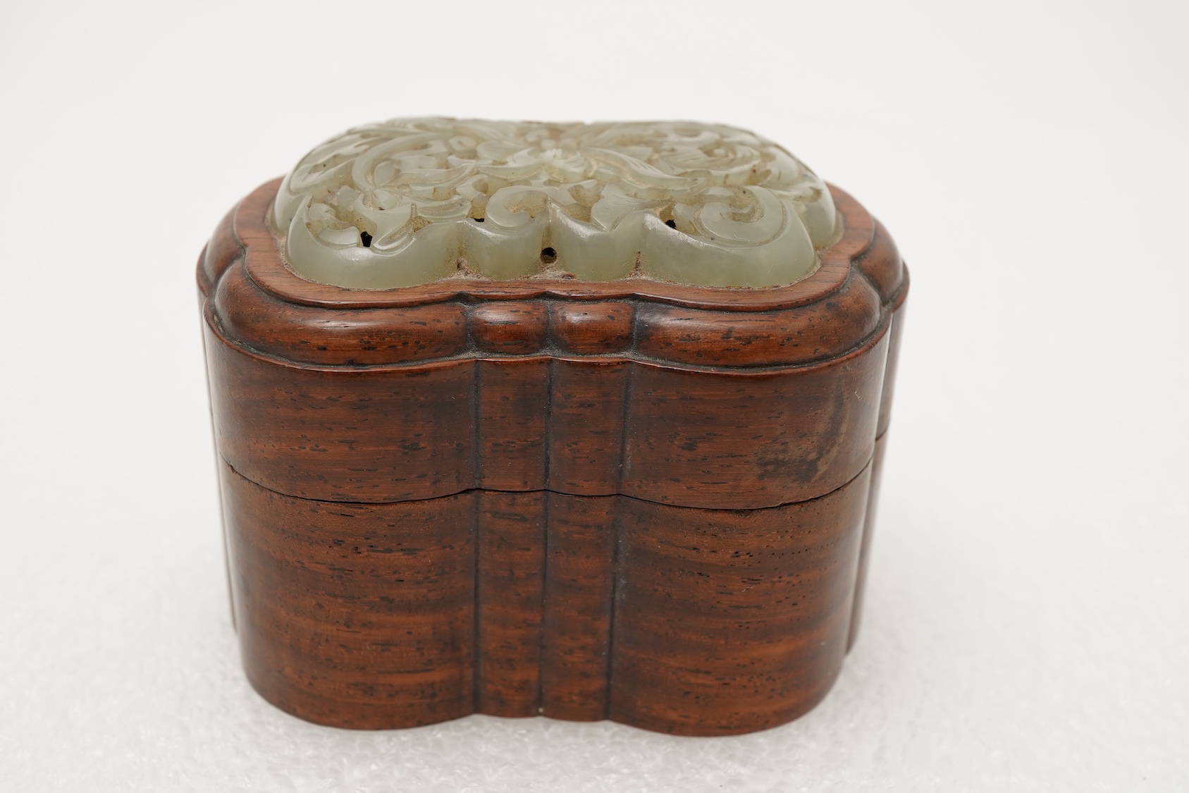 A Chinese jade mounted huanghuali box and cover, 19th century